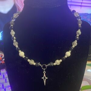 Elegant Black and White Beaded Necklace with Star Charm